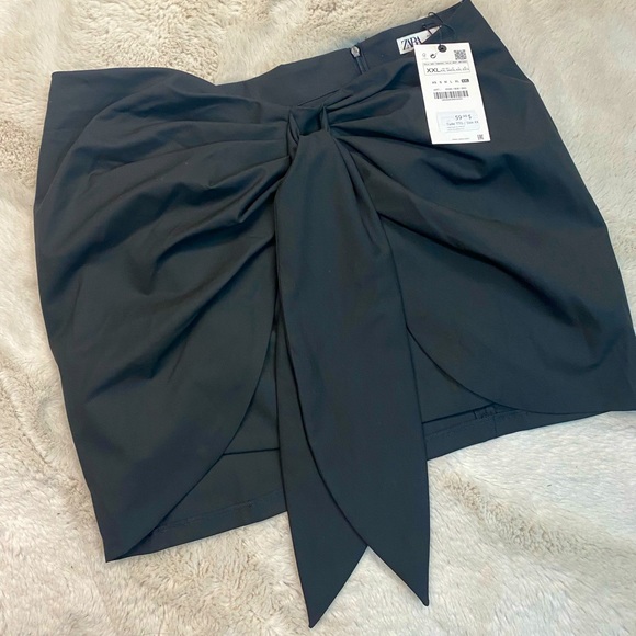 Mini skirt with bow - Picture 1 of 1